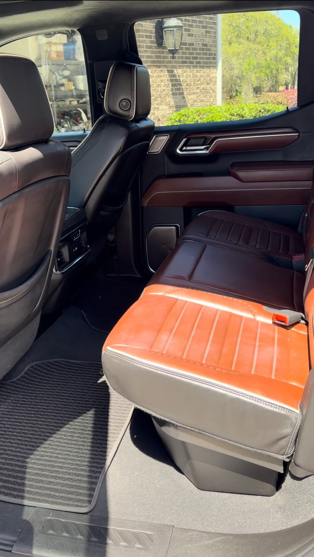 Detailed truck rear cabin with orange leather seats