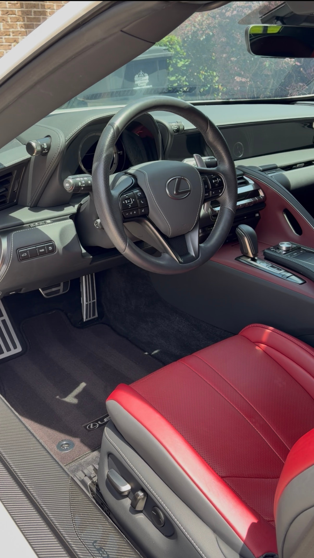 Lexus LC interior with red leather seats after a premium detail